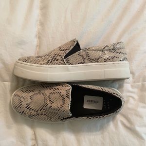 Snakeskin slip ons